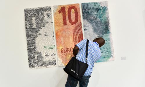 person enjoying art piece